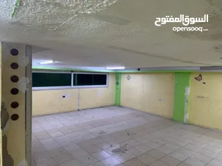  10 عمارة وسط السوق التجاري بين شارع السعادة وشارع الملك عبدالله