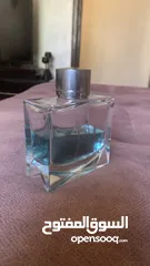  2 عطر دنهل بلاك فارغ نصفه فقط