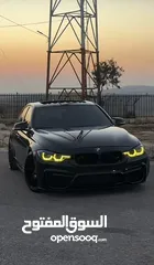  3 BMW 330i سيارة