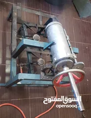  2 الة صنع  ( بلح الشام) الطرمبة - تركي - متكاملة مع قاعدة التركيب ومكان حوض الزيت