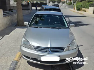  1 ميتشوبيشي لا نسر GLXموديل 2013 - مالك ثاني مواصفات خليجية - ممشى اقل من 100,000 كيلو