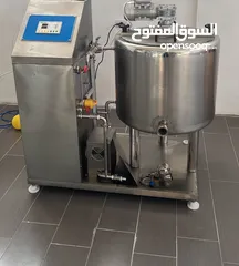  1 ماكنة بسترة حليب + عصير + بوظة + شوكلاتة جديدة لم تستعمل
