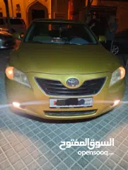  1 تويوتا كامري  2007  GLX  ذهبي تخشيبة وستارة خلفية  شاشة وكاميرا