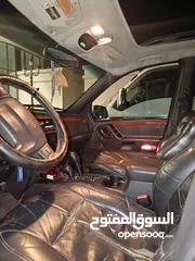  13 مواصفات جيب شروكي 1999