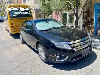  10 فورد فيوجن 2010 نضيفة جدا فل كامل الاضافات فتحة شاشة جلد