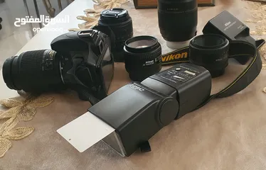  2 inkon D3300with charger and flash light with 4lences