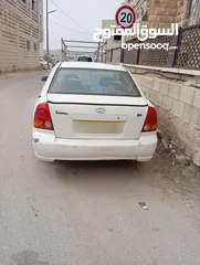  4 سيارة هونداي فيرنا 2003ميكانيكيات جيدة جدا وعيوب بسيطة بالبودي