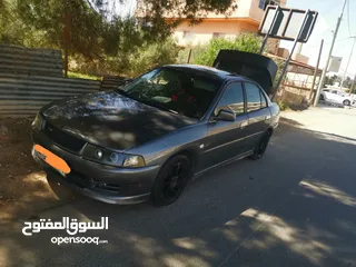  4 لانسر موديل  99 توماتيك خليجي