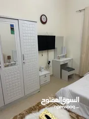  30 For rent in Ajman, studio in Al Yasmeen Towers, opposite Ajman City Centre, new furniture, easy exit