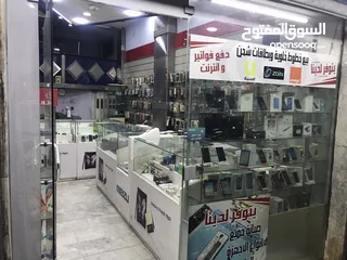  18 محل تجاري للبيع مجهز كامل موقع مميز ملاصق لمعرض شركة زين - شارع باب الواد - الوسط التجاري/ الزرقاء