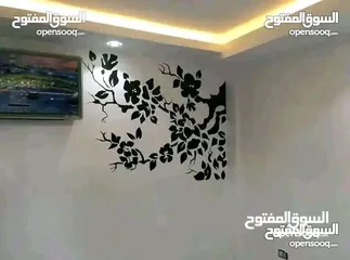  9 رسام علي الجدران mural art
