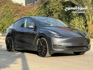  1 Tesla model Y 2022 7 مقاعد