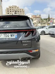  16 هونداي توسان ترخيص 2022 محرك 1600 هايبرد plug in/يقطع على الشحنه 65 كيلو متر