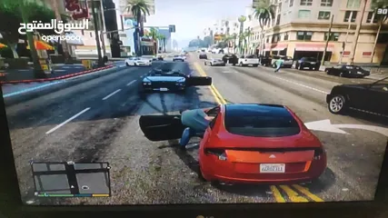  5 PS3 Slim (بلاستيشن 3 سليم) مُهكَّر 150GB + يد أصلية + 11 لعبة