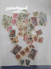  14 طوابع قديمة منذ اكثر من 50 عام