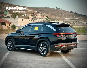  9 هونداي توسان/2022 فل الفل فتحة سقف بانوراما  2x4 ///240Hp بنزين + كهرباء  ( Haybrid) 1600cc