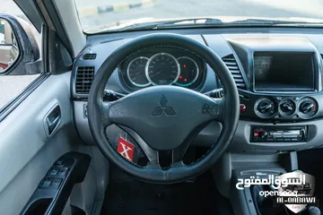  9 Mitsubishi L200 2013   البكب بحالة ممتازة