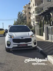  15 سبورتج ماتور 2000 ديزل 4*4 فل اضافات مع بانو راما