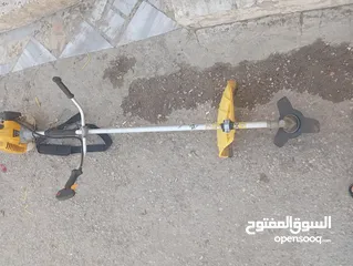  1 ماكينة قص عشب / ماكينة بناشر/ماكينة محطة مياة