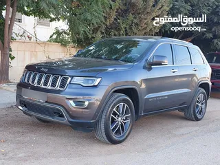  24 جيب جراند شيروكي فل الفل اعلى فئة بانوراما 2014 فحص كامل لون فيراني مميز بسعر مغري قابل للبدل والاقص