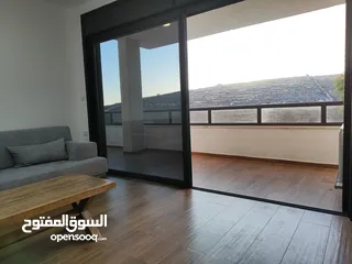  4 شقة جديدة مفروشة مع حديقة للإيجار – عين منجد  شارع إسكان المهندسين