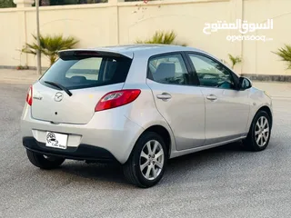  4 Mazda 2 2014