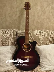  1 SX acoustic guitar