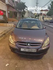  1 بيجو 307 2004