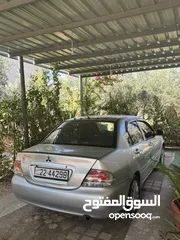  5 ميتسوبيشي 2011Glx