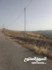  1 قطعه ارض مرتفعه ومطله منطقة شاليهات شرق جرش منطقة حميد  70 دنم سعر مغري جدا تصليح لمشروع استثماري