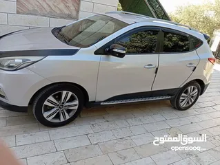 12 هونداي توسان موديل 2014  ترخيص 2014 فل الفل معدا فتحت سقف