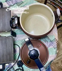  3 طنجرة ضغط  وشواية ساندويشات كهربائيه وفرامة لحمه جديده