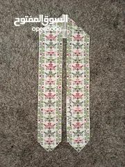  3 تطريز وشاحات تخرج ،تطريز طاقية تخرج ،تطريز تيشرتات ،تطريز اطقم بيبيه