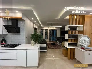  8 شقة مميزة  بإطلالة رائعة وموقع ممتاز مفروشة بالكامل وبتطشيب شخصي جديد وعمارة جديدة