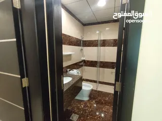  14 Unfurnished two-room VIP apartment in Al Rawda 3 in Ajman, 2 bathrooms, with a balcony