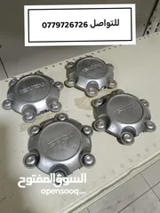  1 غطي طاسات عجال ايسوزو دي ماكس طقم اصلي بحالة الوكالة
