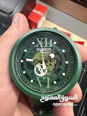  1 Swatch unisex camoflour watch