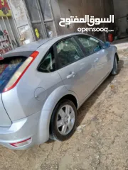  2 فورد فوكس 2009  ايد اولى سيارة  جير عادي اقصادية بل بنزين