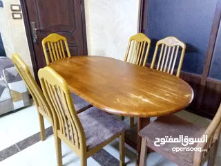  1 طاولة سفرة مع 6 كراسي خشب