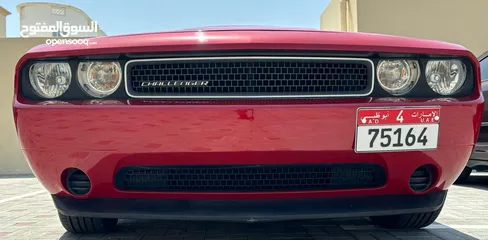  1 Dodge Challenger - Factory Paint - Low Mileage - Negotiable