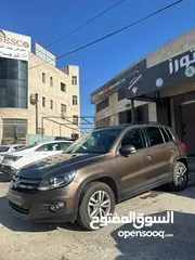  2 تيجوان 2013 ترخيص 2012 فل مسكر  مطور 2000 بنزين  4×4