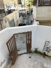  8 شقتين للبيع (أرضي + تسوية)  الزرقاء حي رمزي في منطقة حيوية جداً