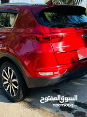  8 كيا سبورتاج موديل 2019 لون احمر مواصفات EX بصمة شاشة كبيرة نقطة عمياء كشن السائق كهرباء داخل بيجي