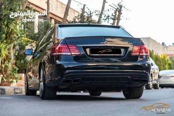  5 Mercedes E200 Avantgarde Amg kit 2015  السيارة وارد و بحالة الوكالة