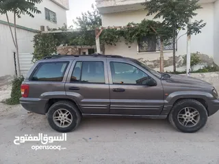  4 مواصفات جيب شروكي 1999