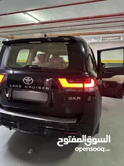  11 لاند كروز GXR 2024 TWIN TERBO كويت جديد زيرو فل اضافات اصلي 100% شاشات خلفيه خمس كاميرات للجادين فقط