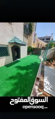  23 عشب صناعي (ترتان) وأشجار و ورد صناعي