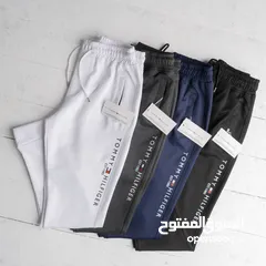  12 بنطلون tommy بخامه غطس مستورد ضمان عام كامل