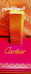  2 قداحة كارتير Cartier  الفاخره مطليه ذهب بحالة الوكاله فرنسيه  أصليه