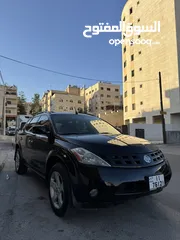  2 نيسان مورانو 2003 فحص 3 جيد واحد قصعه خلفيه السياره بحال الوكالة لا تحتاج اي نوع من الصيانه
